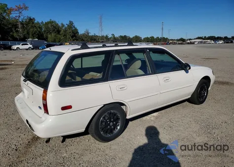 1997 Ford Escort Lx z USA, uszkodzony, nr VIN 3FALP15P3VR110638